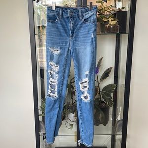 Distressed AE skinny jeans